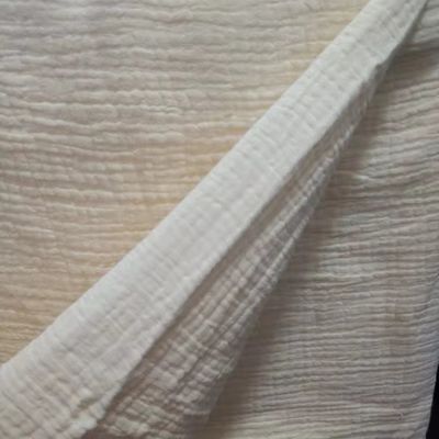 Fabbricazione di finitura a rughe 100% cotone muslino tessuto di garza per coperte per bambini e pigiami in stile solido