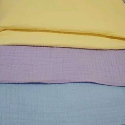 Fabbricazione di finitura a rughe 100% cotone muslino tessuto di garza per coperte per bambini e pigiami in stile solido